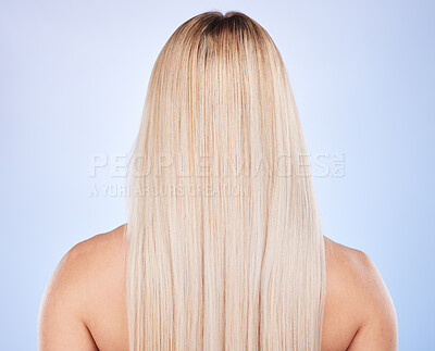 Buy stock photo Hair care, beauty and back of woman in studio isolated on a blue background. Haircare, keratin cosmetics and female model with blonde hairstyle after salon treatment for growth, texture or balayage.