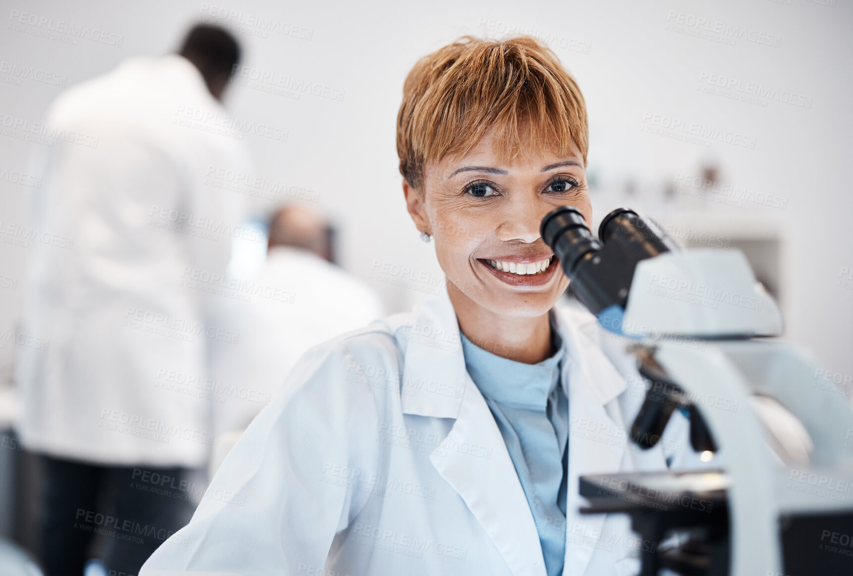 Buy stock photo Woman, medical science and portrait with a microscope in a laboratory for research, analysis and study. Mature scientist person in lab for development, future medicine and biotechnology with a smile