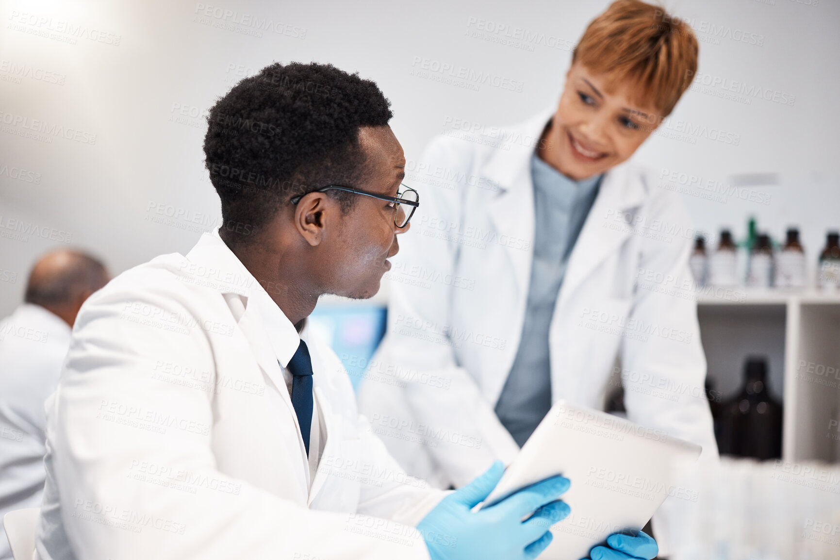 Buy stock photo Science team, research and people with tablet in laboratory for experiment, study and medical results. Healthcare, pharmaceutical and scientists talking with digital tech for vaccine data analysis