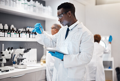 Buy stock photo Science, research and black man test tube and tablet for medical analysis and innovation in laboratory. Pharmaceutical analytics, medicine study and scientist in South Africa checking vaccine results