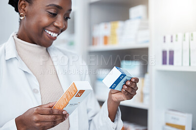 Black woman, pharmacist and choice with box, medicine and decision with prescription for healthcare. Pharmacy, drugs and pharmaceutical pills for health, wellness or medical store with stock on shelf