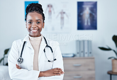 Portrait, happy and black woman doctor proud in hospital, excited and cheerful for healthcare innovation. Face, confident and female health expert smile for medical, mission or ready to help at clinic