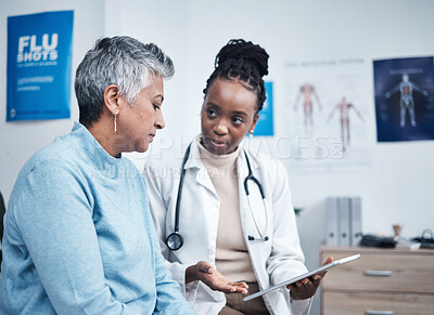 Buy stock photo Black woman, doctor and senior patient with tablet, results and listen for health planning, advice or cancer. African medic, mobile touchscreen and healthcare with trust, tech and support in hospital