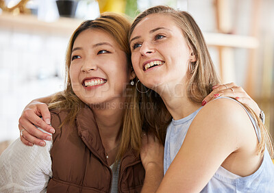 Buy stock photo Smile, friendship and women hugging in cafe, happy, love and weekend fun for asian woman and friend. Hug, laugh and diversity, smiling friends embrace and relax in restaurant for brunch date at table