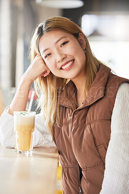 Buy stock photo Happy, cafe and portrait of a woman with a drink in the morning for breakfast at a coffee shop. Smile, happiness and beautiful Asian girl with a beverage at a restaurant for enjoyment and relaxation