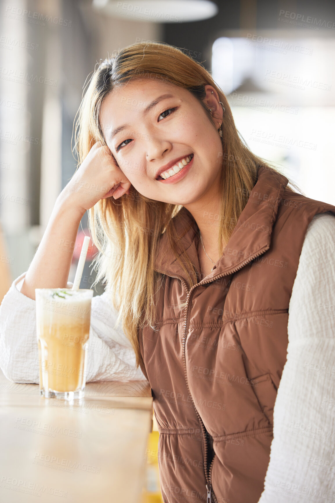 Buy stock photo Happy, cafe and portrait of a woman with a drink in the morning for breakfast at a coffee shop. Smile, happiness and beautiful Asian girl with a beverage at a restaurant for enjoyment and relaxation