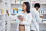 Pharmacy stock check, Indian pharmacist and tablet checklist of medicine and pills. Woman, digital work and pharmaceutical products in a retail shop or clinic with healthcare and wellness employee 