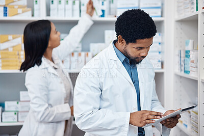 Buy stock photo Pharmacy tablet, product inventory or black man doing stock take in retail drugs store or healthcare pharmaceutical shop. Clinic people, check pills shelf or medical pharmacist with digital checklist