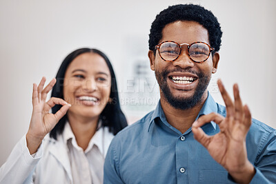 Buy stock photo Perfect, ok and portrait of optometrist with sign or gesture for new glasses, vision and and eye care in a clinic. Medical, people and black man with healthcare professional accept with smile