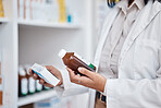 Pharmacy stock, hands and drug information of medicine and pills ingredients reading. Pharmacist, work and pharmaceutical products in a retail shop or clinic with healthcare and wellness employee 