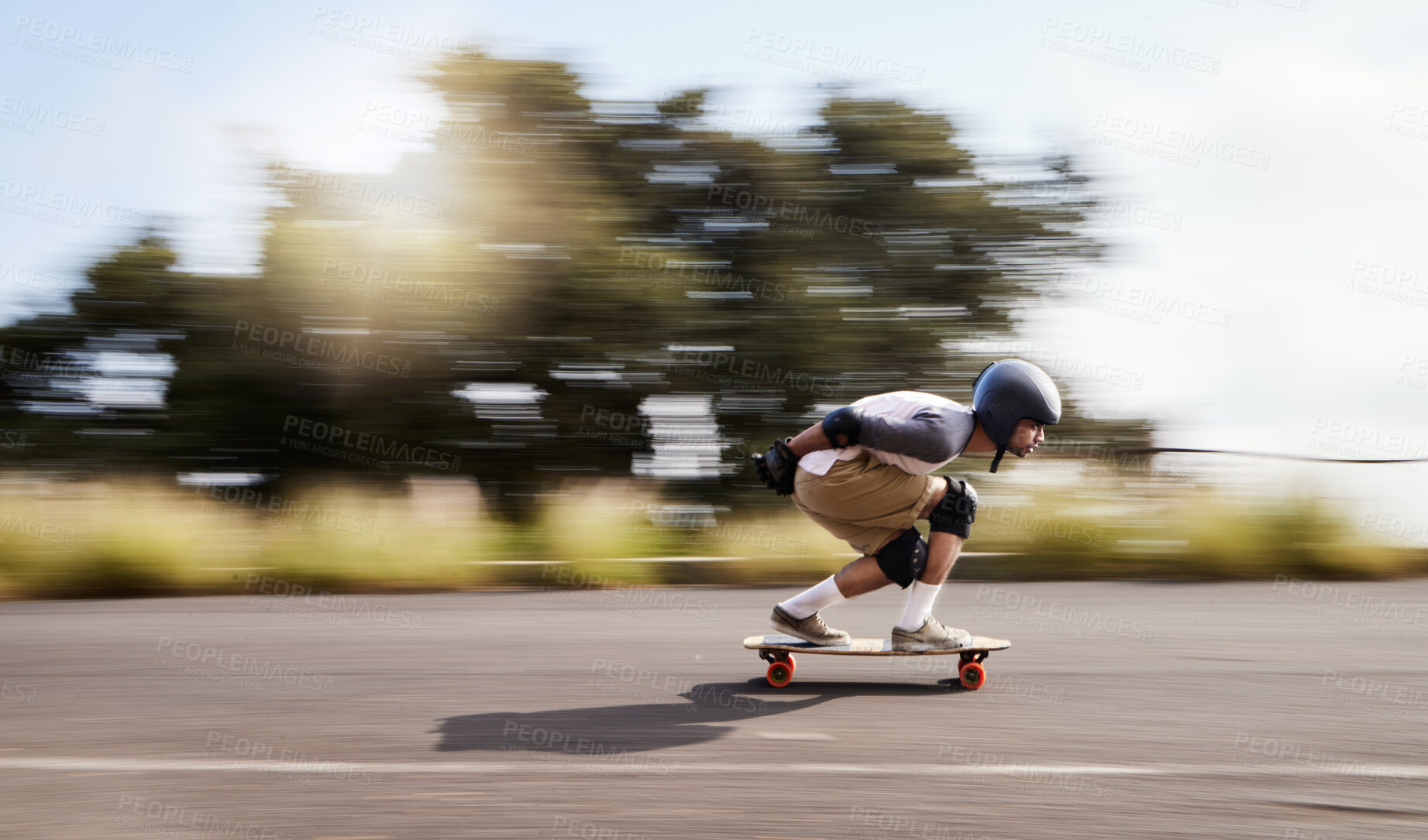 Buy stock photo Skateboard, motion blur and mountain with man in road for speed, freedom and summer break. Sports, adventure and wellness with guy skating fast in street for training, gen z and balance in nature