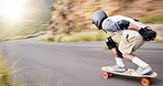 Skateboard, motion blur and man speed in road for sports competition, training and exercise in city. Skating, skateboarding and male skater for adrenaline, adventure and freedom in extreme challenge