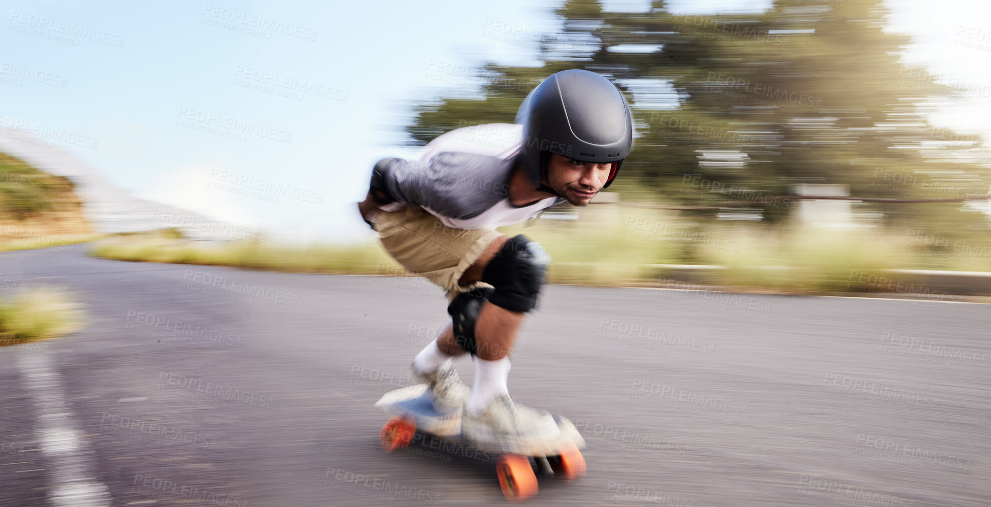 Buy stock photo Skateboard, fast and mountain with man in road for speed, freedom and summer break. Sports, adventure and motion blur with guy skating in urban street for training, gen z and balance in nature