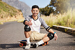 Young man outdoor, skateboard and skater with fitness on country road with smile in portrait and extreme sport. Happiness, exercise and skating, gen z male and hobby with training and sports