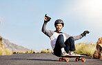 Skateboard, slide and man in road for sports competition, fitness training and exercise on mountain. Skating, skateboarding and male skater riding for speed, adventure and freedom for sport challenge