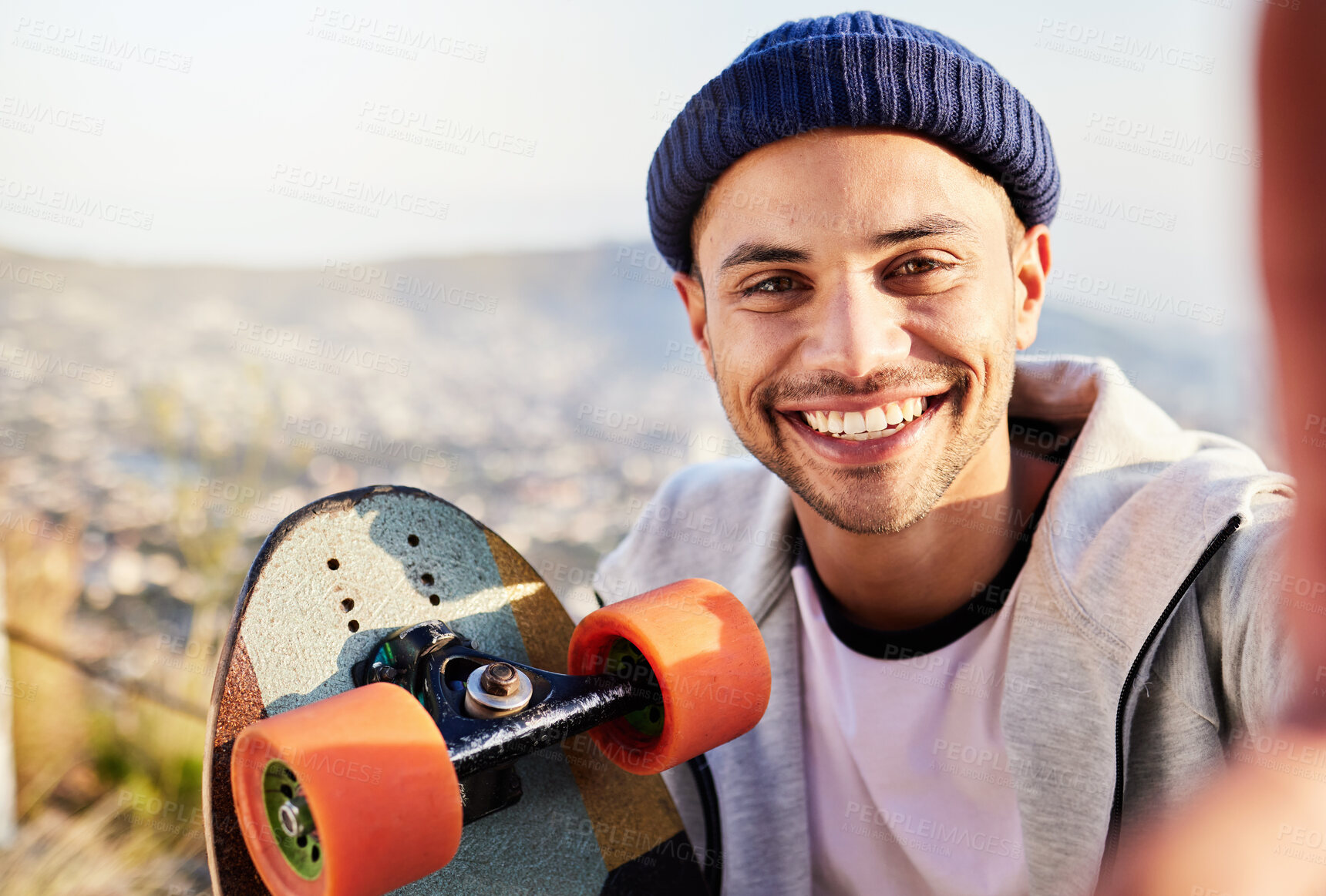 Buy stock photo Portrait, selfie and view with a skater man in nature, taking a picture while outdoor for a skate. Summer, skateboard or photograph with a happy male outside in the mountains for recreation skating