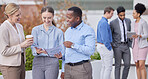 Group of business people, diversity and talking outside office with smile together on break from work. Discussion, brainstorming and employees networking with b2b, and human resources team outdoors.