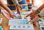 Color design, creative and hands of business people point on desk for branding meeting, strategy and marketing. Teamwork, collaboration and designers brainstorming logo ideas, thinking and planning