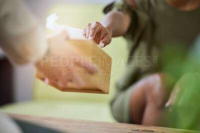 Buy stock photo Therapist hand, tissue box and black woman at therapy consultation for grief and depression help. Mental support, healthcare appointment and sad female with trust and blurred background in a office