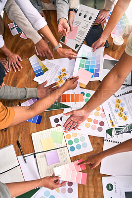 Buy stock photo Color, design palette and hands of business people on desk for branding meeting, strategy and marketing. Teamwork, paper and top view of designers brainstorming ideas, thinking and creative project