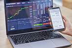 Phone screen, laptop and hands trading on stock market in office for fintech, investment or cryptocurrency. Smartphone, ui data and business woman with mobile to invest with statistics or graphs.