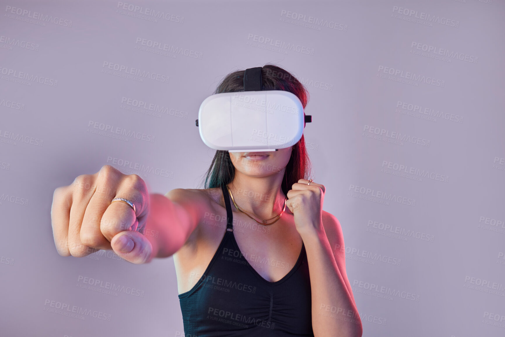 Buy stock photo Vr, fitness and woman boxing in metaverse studio isolated on a purple background mockup. 3d exercise, virtual reality and female fighting or punching with futuristic technology for esports gaming.