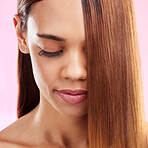 Beauty, hair and zoom on face of black woman isolated in studio with pink background for salon advertising. Haircare, straightener and Brazilian hairstyle on model for luxury growth product promotion