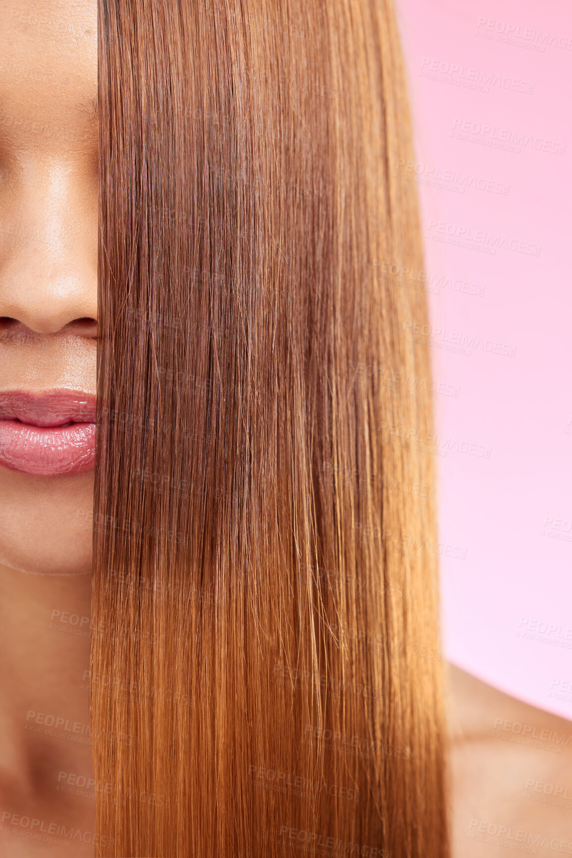 Buy stock photo Beauty, hair and half face of black woman isolated in studio with pink background for salon advertising. Haircare, straightener and Brazilian hairstyle on model for luxury growth product promotion.