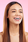 Beauty cosmetics, hair and woman with a smile in studio for salon, hairdresser or shine. Skincare glow or hairstyle of aesthetic model person on a pink background laughing with self care skin bliss