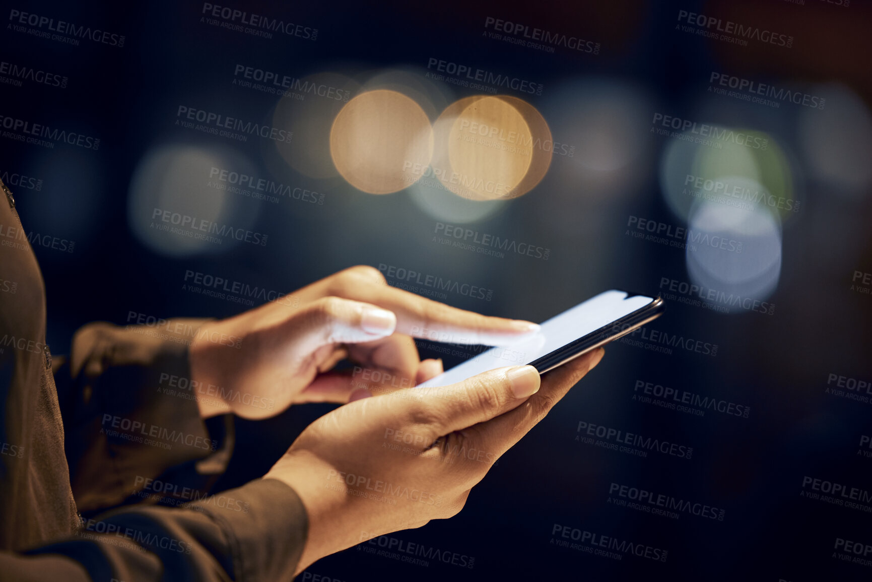 Buy stock photo Closeup, hands and person with smartphone, night and typing with connection, communication and chatting. Zoom, woman and female with cellphone, light and search internet for information and website