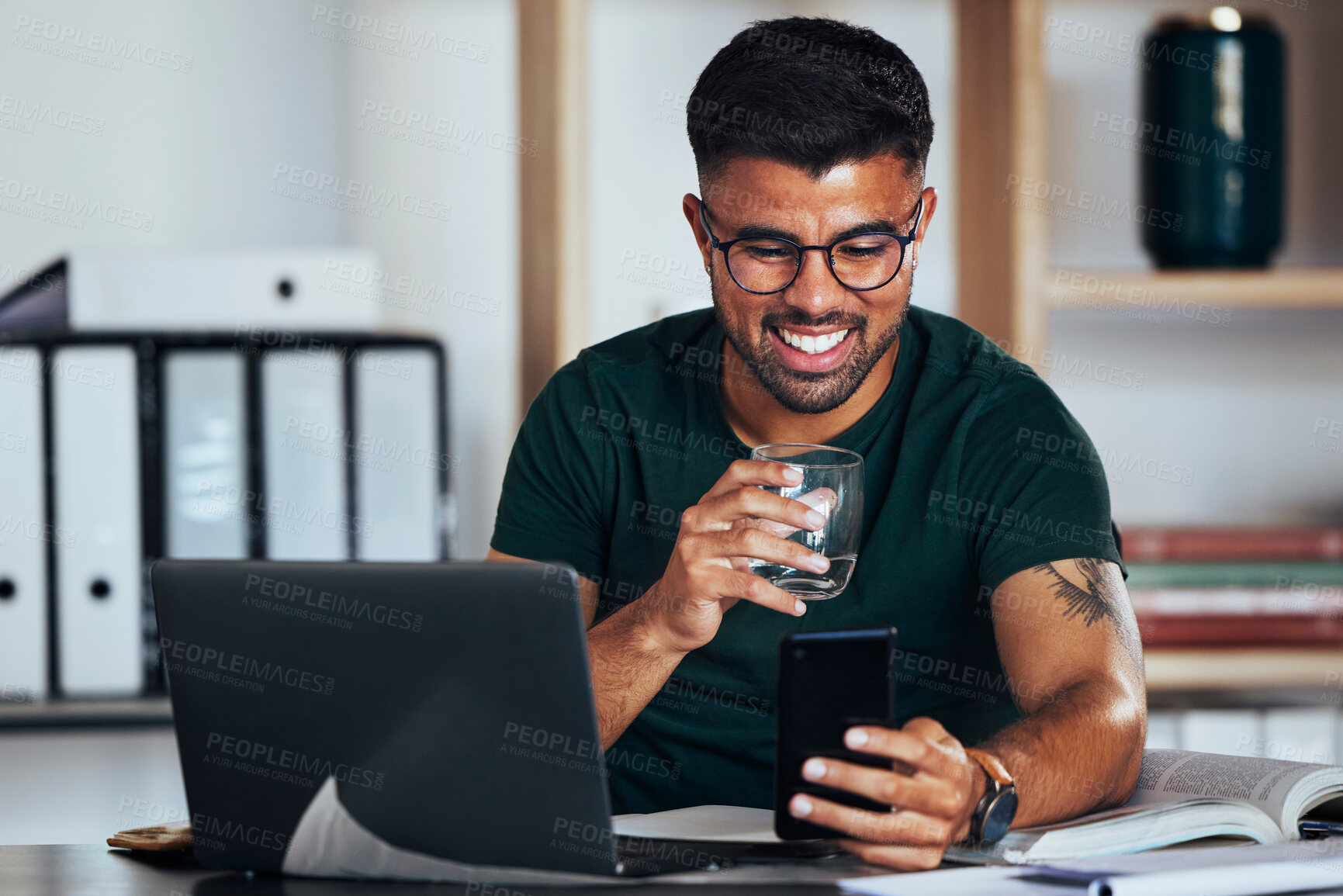 Buy stock photo Business, happy and man drinking water with a phone for communication, social media and a meme. Smile, working and employee reading a funny chat, message or notification on a mobile app with a drink
