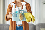 Hands, housekeeper and woman maid cleaning home with equipment, housework and person for hygiene clean house. Maintenance, service and disinfectant product by maid in living room housekeeping