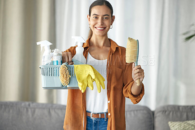 Cleaner woman cleaning kitchen counter with cloth, spray bottle and rubber  gloves in modern home in Stock Photo by YuriArcursPeopleimages