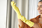 Woman, hands or rubber gloves for spring cleaning, housekeeping or home maintenance of healthcare wellness. Smile, happy or maid cleaner ready for hospitality service in bacteria or safety protection