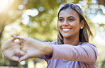 Sports, nature and woman doing a stretching workout before a workout in the park or garden. Fitness, wellness and female athlete doing a arm warm up exercise before pilates training outdoor in field.