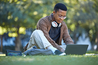Buy stock photo Black man, park studying and laptop work in a campus garden working on web education. Outdoor, happiness and online elearning with a textbook of a student busy with exam study on university grass