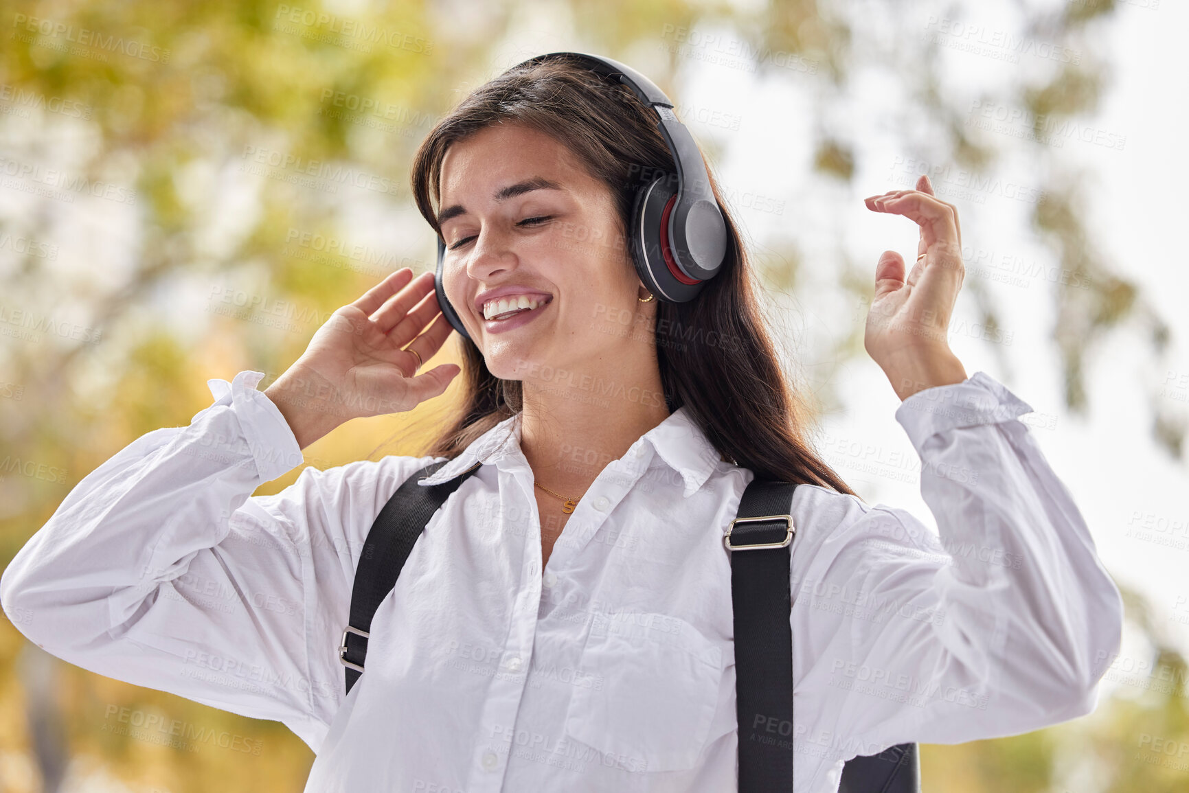 Buy stock photo Music, college and happy with woman in park for streaming, education and online radio. Learning, study and technology with student listening to headphones on campus for university, freedom and relax