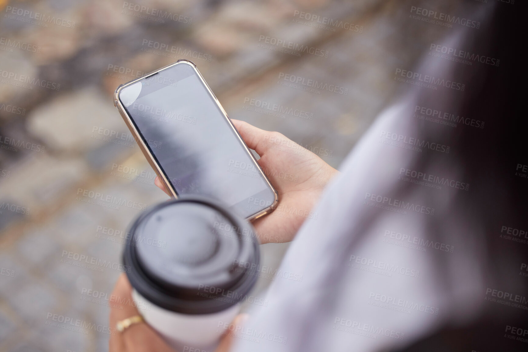 Buy stock photo Phone, coffee and screen with a woman in the city browsing social media or typing a text message from above. Contact, texting and 5g mobile technology with a female person outside in an urban town