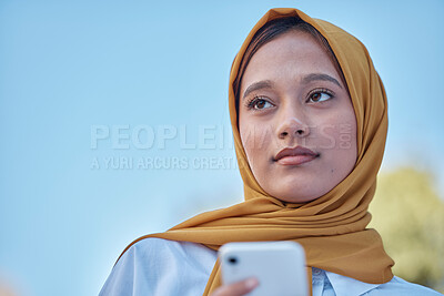 Buy stock photo Muslim, young woman in hijab and outdoor with phone, travel with social media and face with peace and calm. Islamic fashion, youth and gen z with thinking, smartphone and female in Dubai with mockup