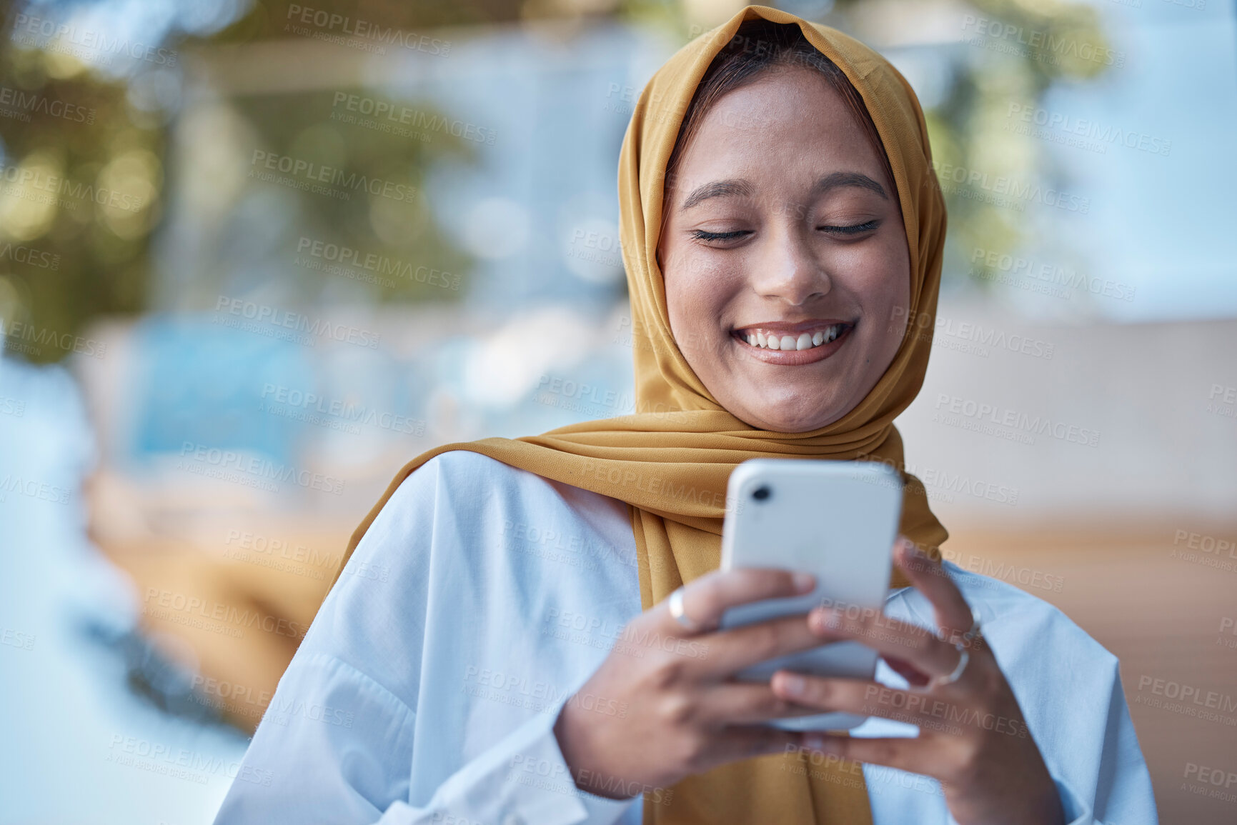 Buy stock photo Phone, outdoor and happy muslim woman on international network, 5g communication and mobile app chat. Young hijab entrepreneur or islamic person from Saudi Arabia typing on cellphone for opportunity