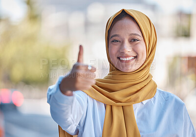 Buy stock photo Thumbs up, smile and portrait of Muslim woman in city for achievement, relax and natural in Indonesia. Islamic, positive and confident with girl wearing hijab in urban town for yes, agreement and joy