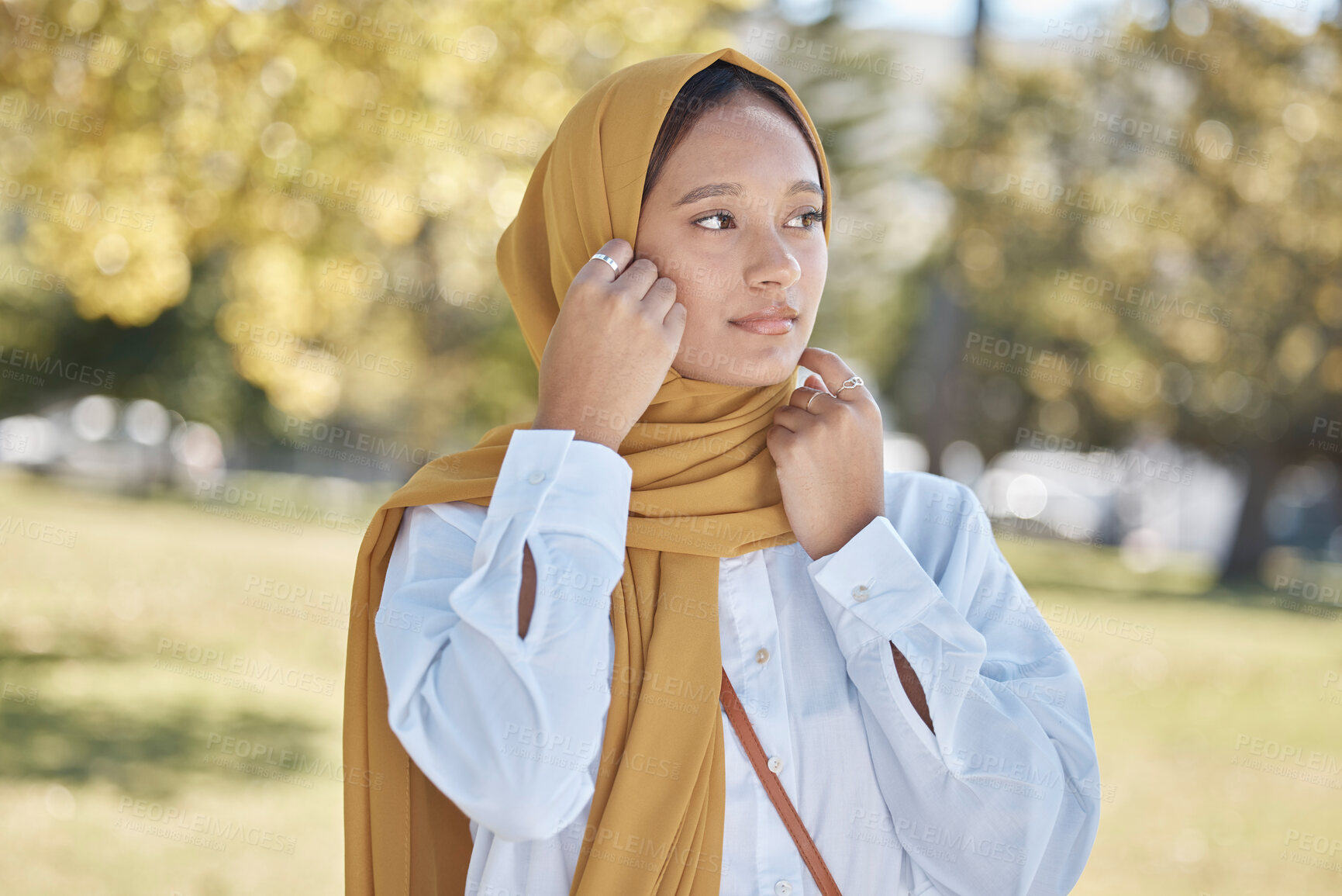 Buy stock photo Muslim, young woman in park with hijab, freedom and travel with day out in nature, peace and calm outdoor. Islamic fashion, youth and gen z with adventure, lifestyle and female in Dubai with mockup