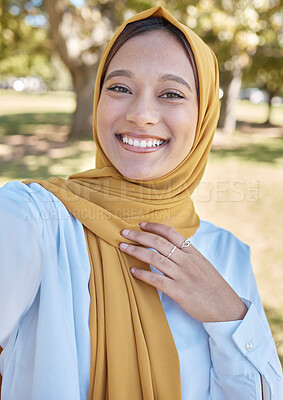 Buy stock photo Muslim, young woman and selfie with hijab outdoor, happy influencer with travel blog, freedom in nature and vacation. Islamic fashion, gen z youth and female smile in picture in Dubai with memory