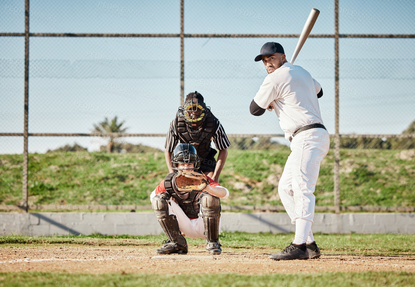 Buy stock photo Baseball, bat and concentration with a sports man outdoor, playing a competitive game on mockup. Fitness, health and exercise with a male athlete or player training on a field or pitch for sport