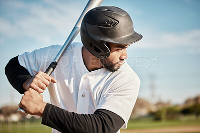 Baseball, bat and serious with a sports man outdoor, playing a competitive game during summer. Fitness, health and exercise with a male athlete or player training on a field for sport or recreation