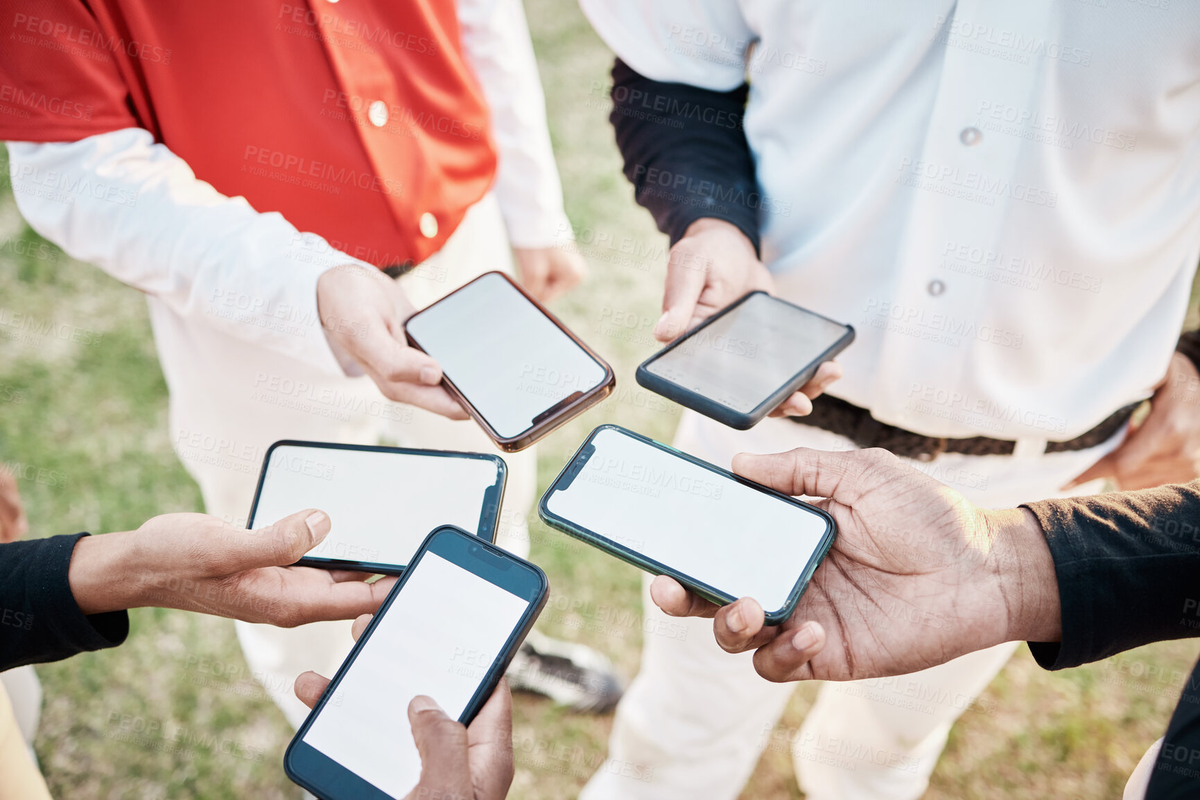 Buy stock photo Hands, phone and communication with a baseball team outdoor on a sport field for strategy or tactics before a game. Teamwork, fitness and networking with a group of people sharing sports information