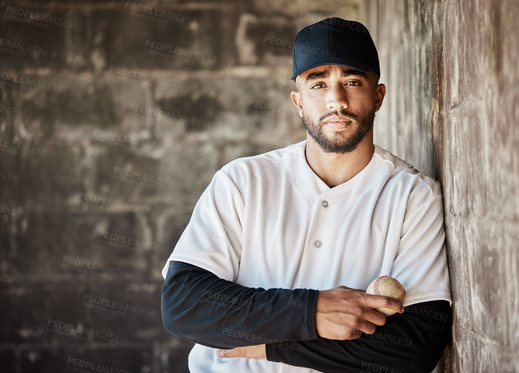 Buy stock photo Baseball, serious and portrait of man with ball ready for game, match and practice in stadium. Softball mockup, motivation and male player focus in dugout for training, exercise and sport competition