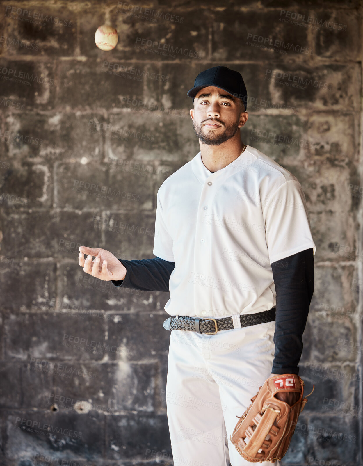 Buy stock photo Baseball, sports and portrait of man with ball on wall background ready for game, match and practice. Softball mockup, motivation and male player in dugout for training, exercise and competition