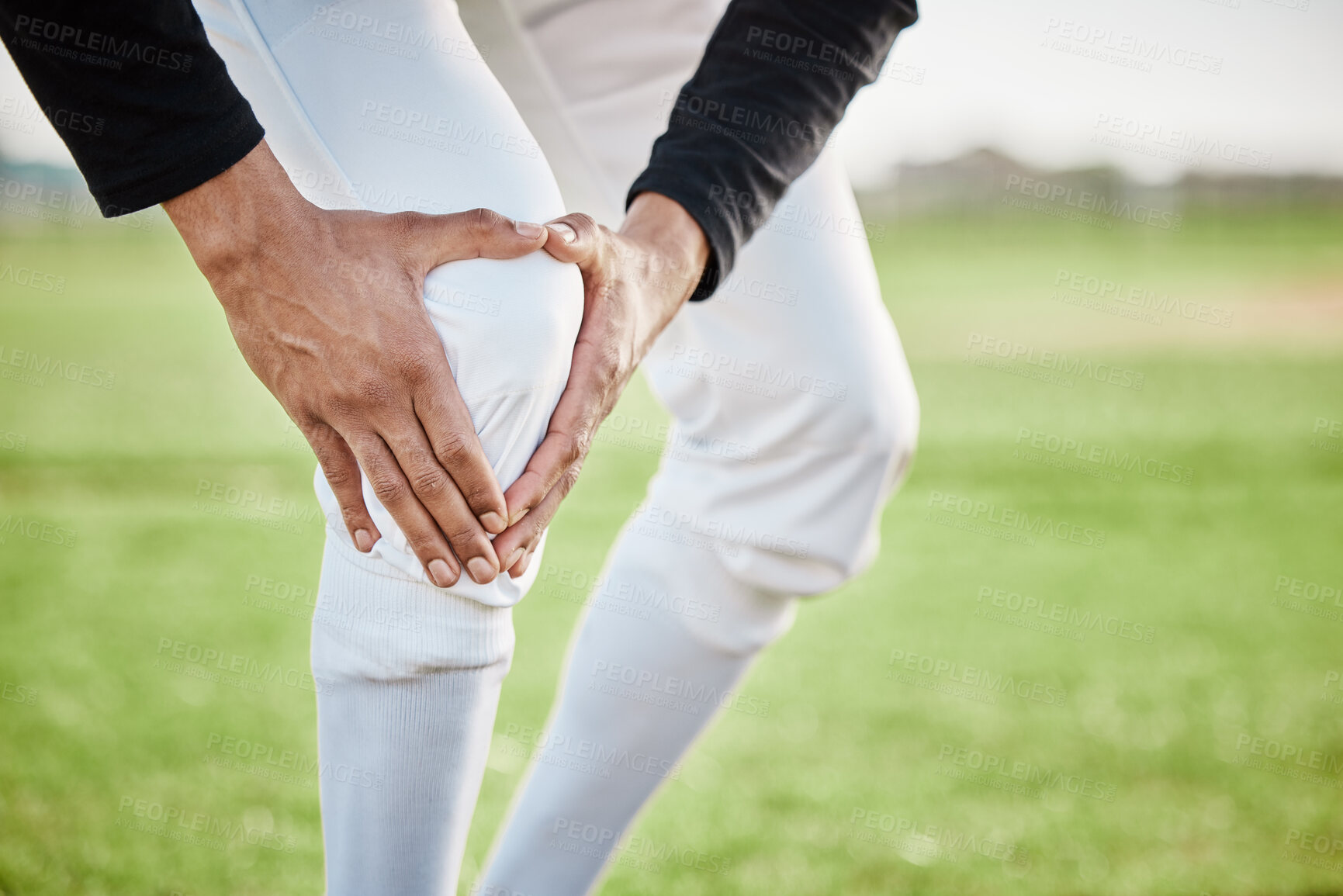 Buy stock photo Baseball, pain and hands with knee injury on field after accident, fall or workout in match. Sports, training and player man with fibromyalgia, inflammation or broken leg, arthritis or tendinitis.