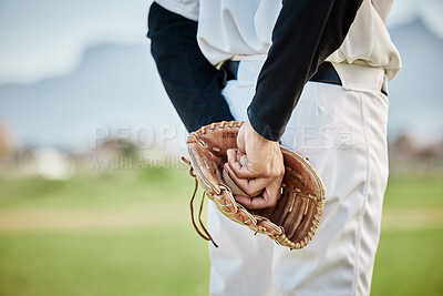 Hands, back view or baseball player training for a game or match on outdoor field or sports stadium. Fitness, softball or focused man pitching or holding a ball with glove in workout or exercise